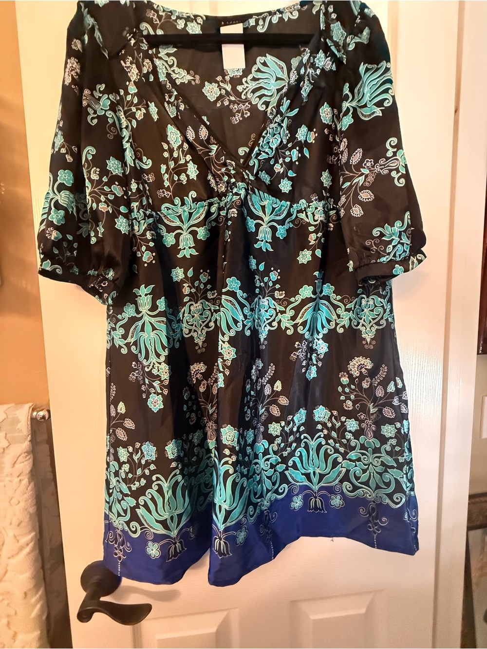 B. Smart Black Mini Dress with Teal Floral Border